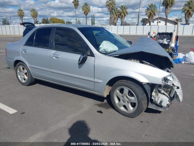  Salvage Mazda Protege