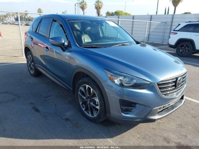  Salvage Mazda Cx